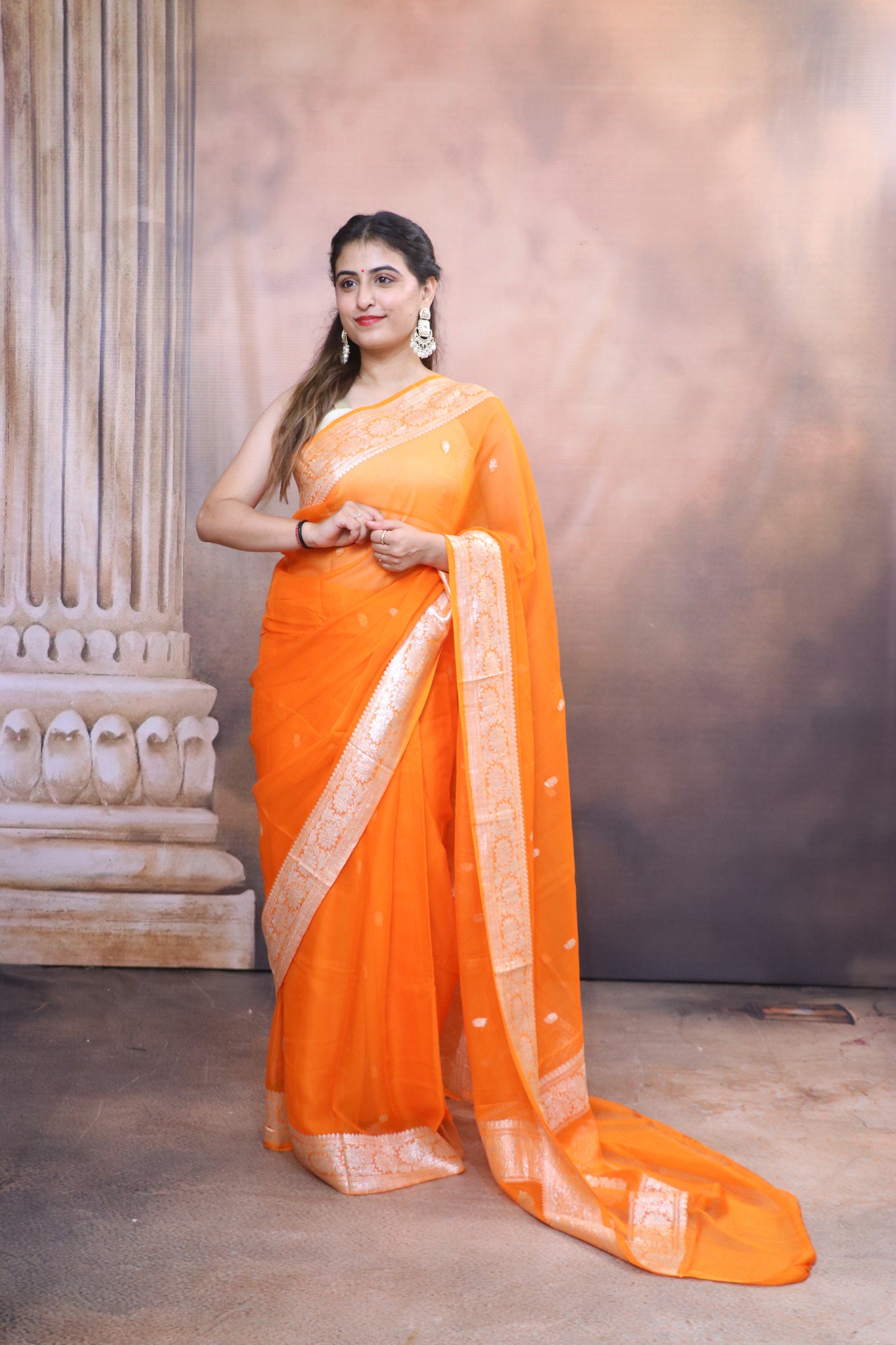 Handcrafted Khaddi Chiffon Saree With Kadua Buttis and Pure Silver Zari- Orange