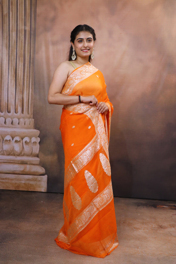 Handcrafted Khaddi Chiffon Saree With Kadua Buttis and Pure Silver Zari- Orange