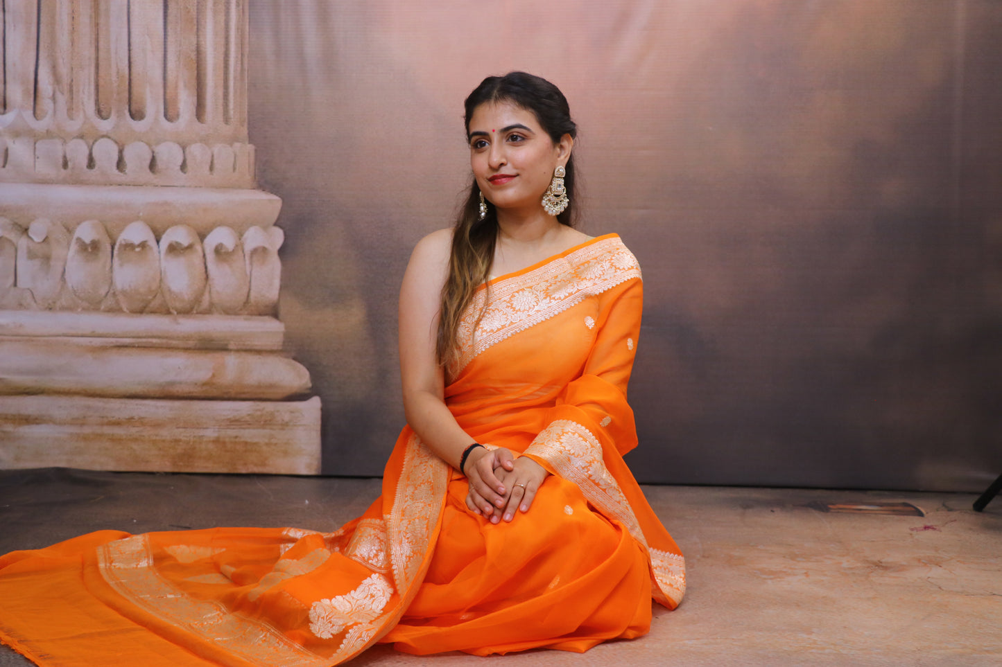 Handcrafted Khaddi Chiffon Saree With Kadua Buttis and Pure Silver Zari- Orange